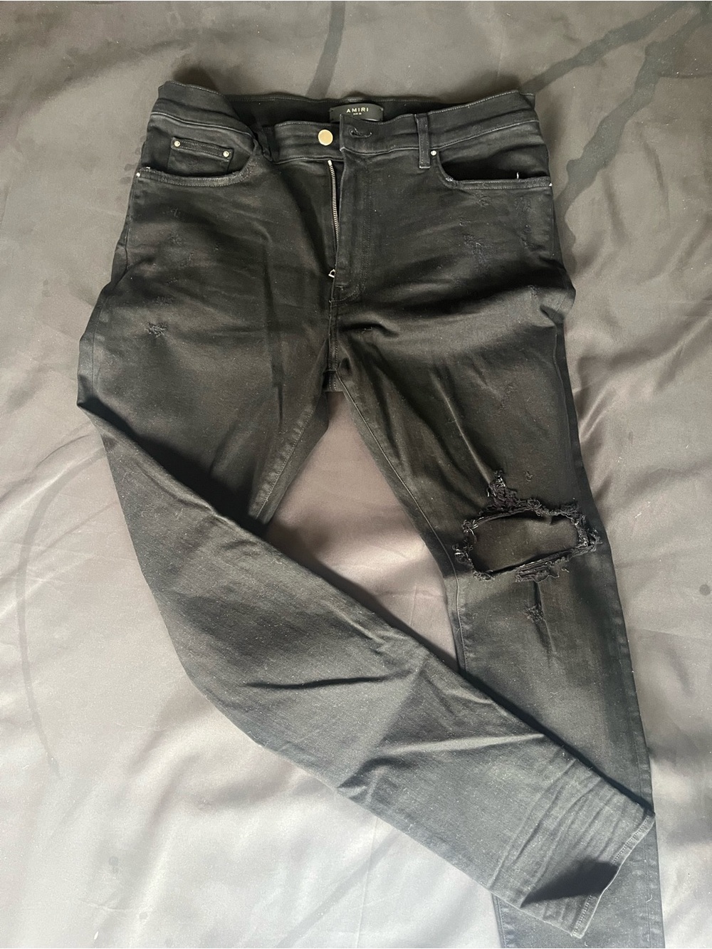 AMIRI Black Distressed Skinny Jeans